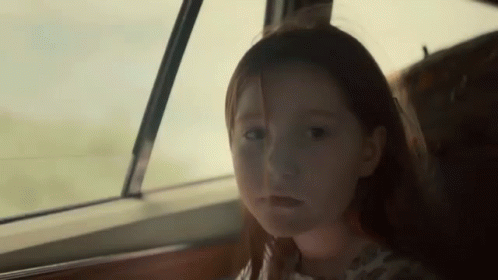 An animated excerpt from The Glass Castle showing a child riding in the car with the landscape moving outside.